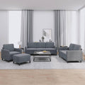 Divano confortevole grigio scuro con braccioli rivestimento in velluto